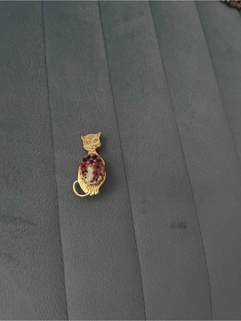 Gold Cat Brooch with Red Speckled Stone